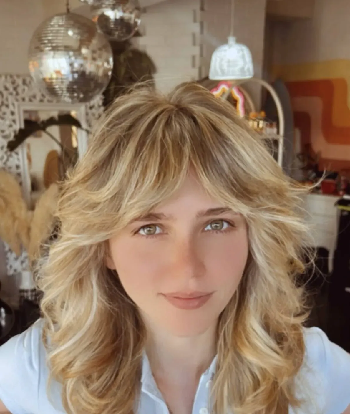 Californian blonde shag with a curtain fringe and bright face-framing pieces